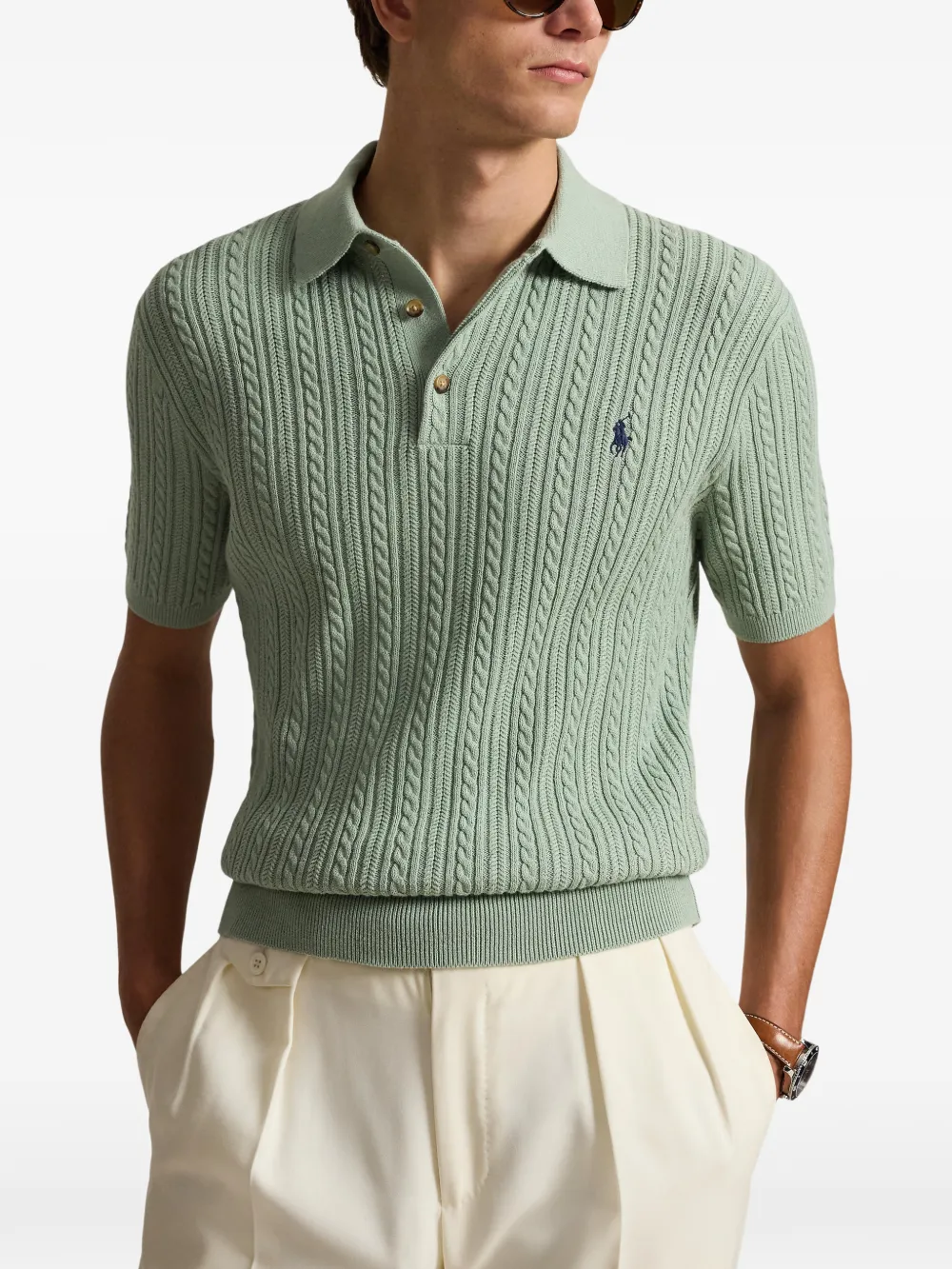 Green shirt worn by a person, showing the shirt fit