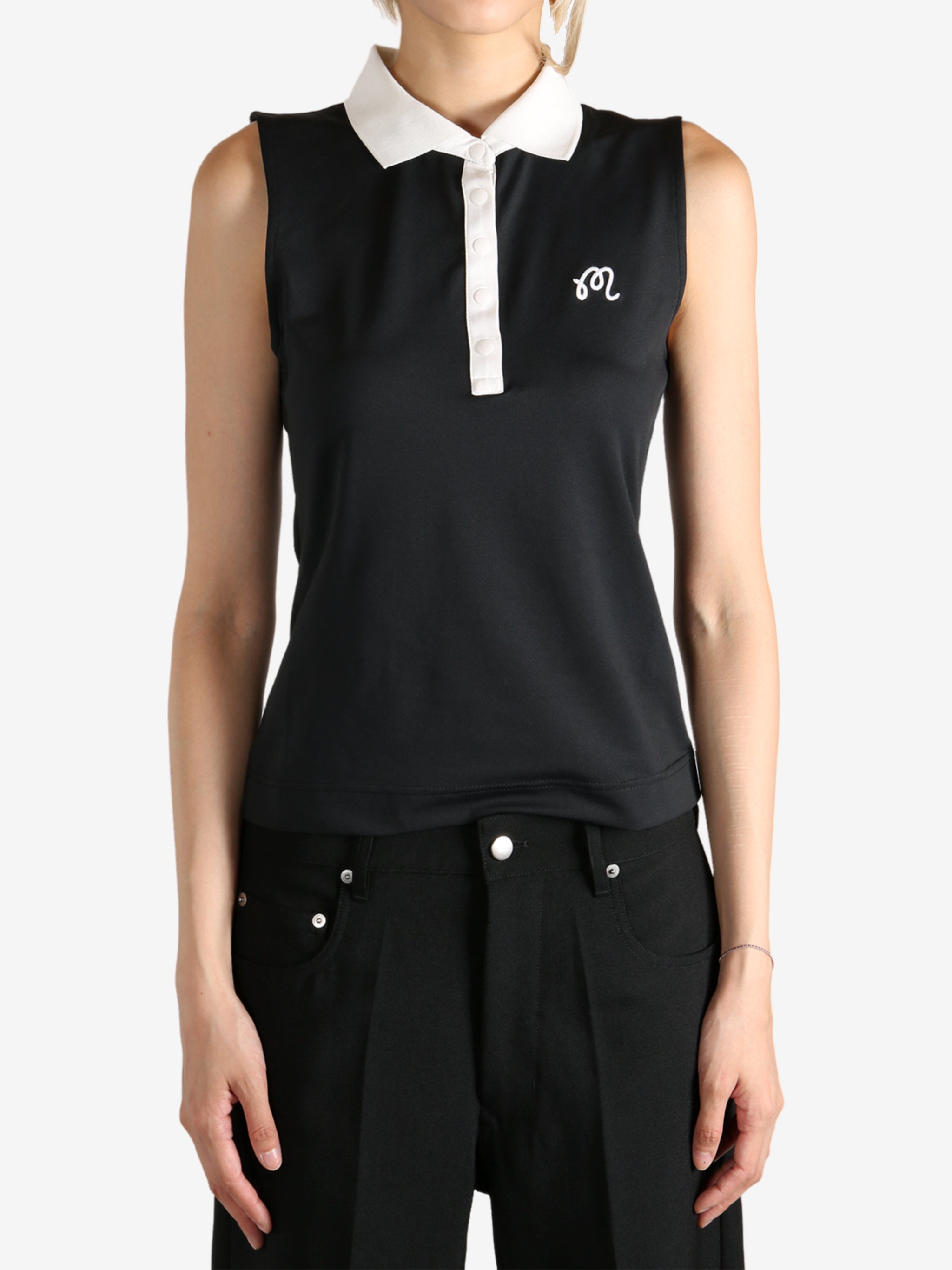 Black shirts worn by a person, showing the shirts fit