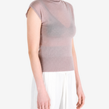 Brown top worn by a person, showing the top fit