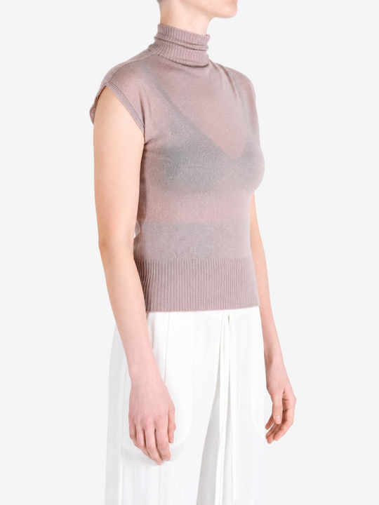 Brown top worn by a person, showing the top fit