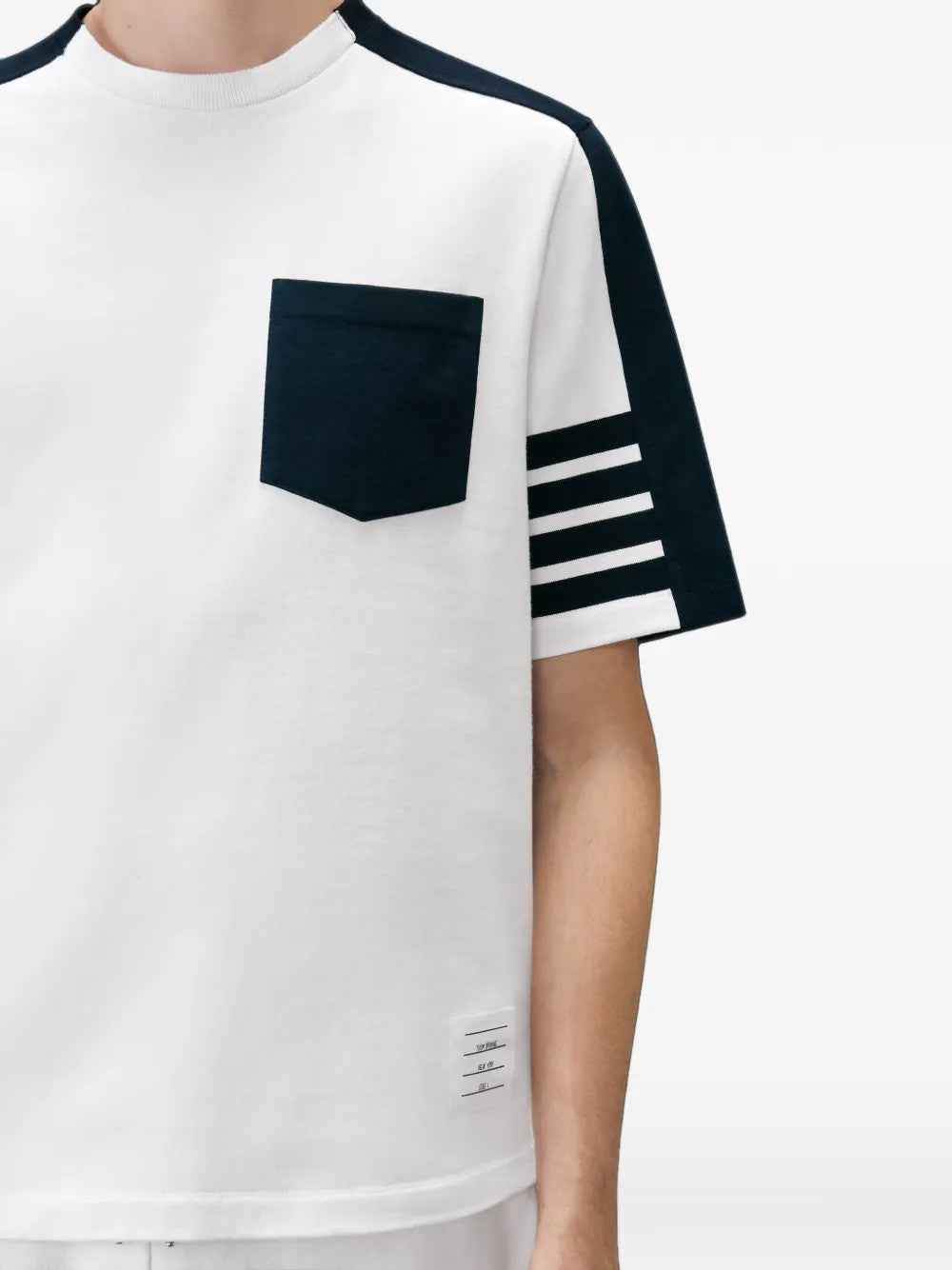 Close up of White t-shirt, showing texture of the 100% cotton fabric