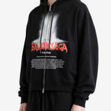 Black hoodie worn by a person, showing the hoodie fit