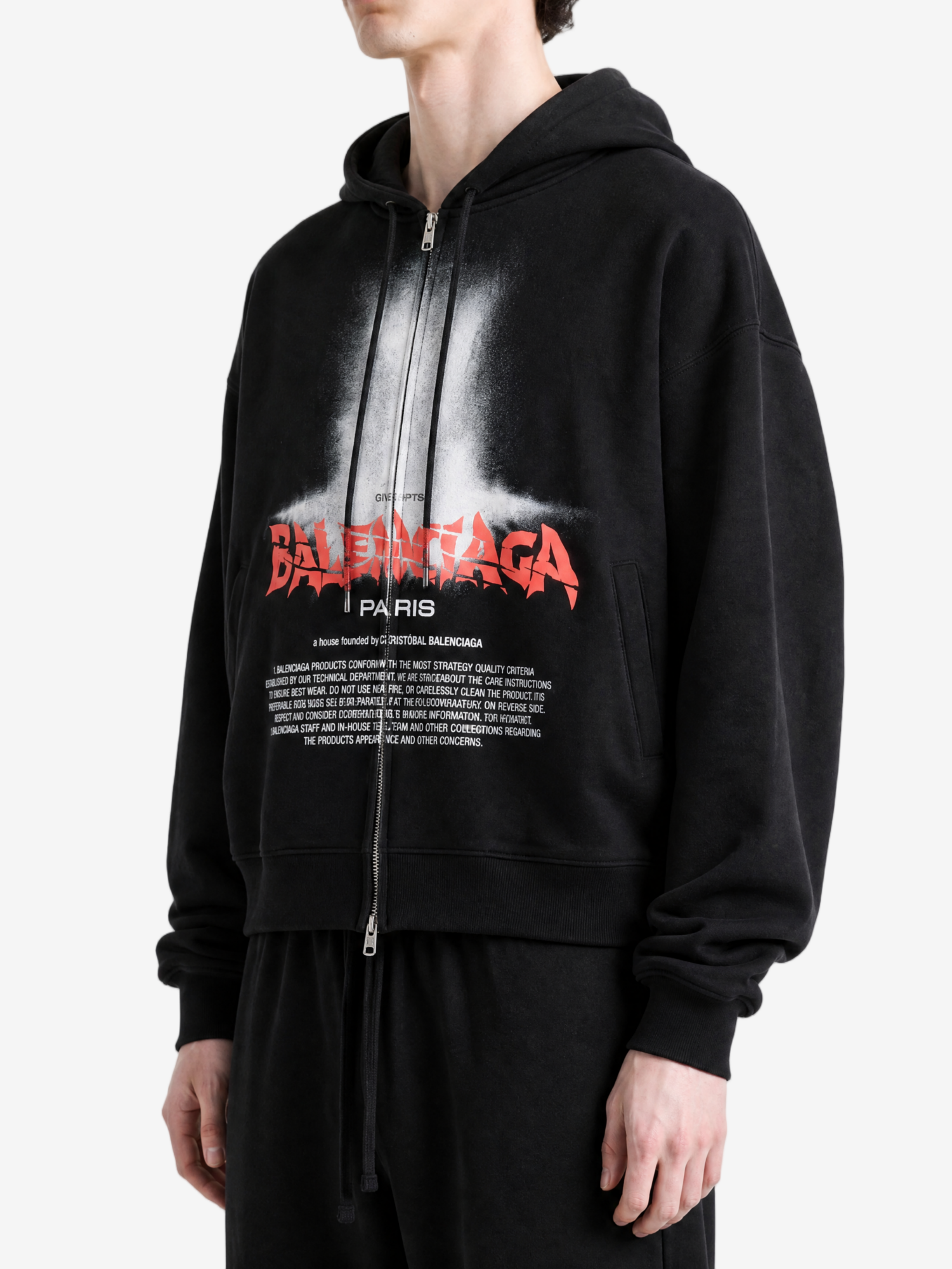 Black hoodie worn by a person, showing the hoodie fit