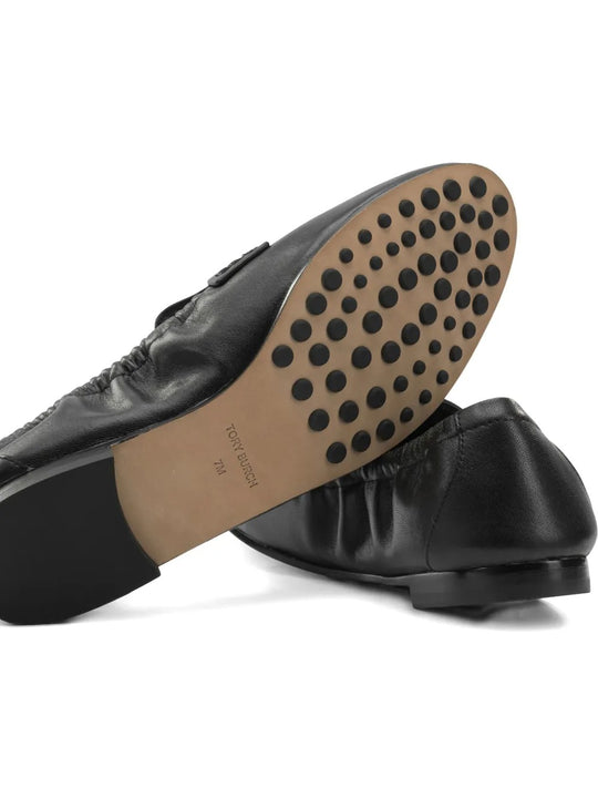 Black loafer, side view