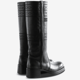 Black boots, back view