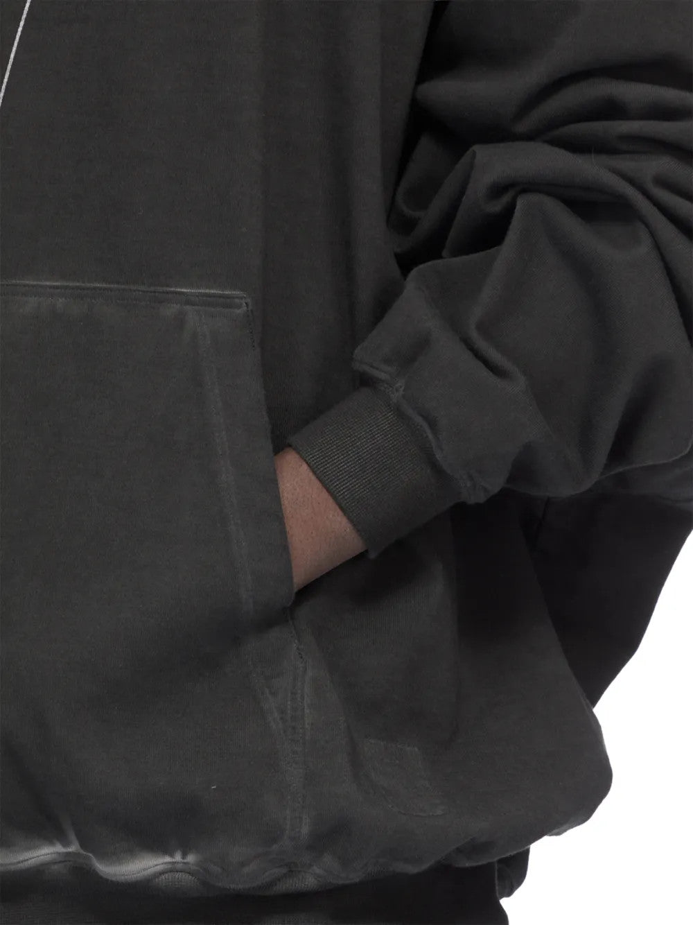 Black t-shirt worn by a person, showing the t-shirt fit