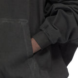 Black t-shirt worn by a person, showing the t-shirt fit