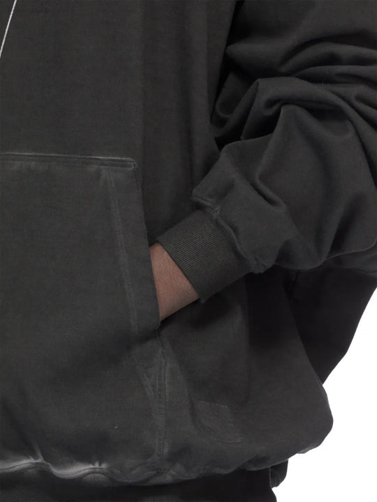 Black t-shirt worn by a person, showing the t-shirt fit