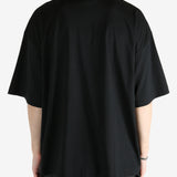 Black t-shirt worn by a person, showing the shirt's fit