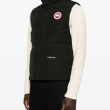Black jacket worn by a person, showing the jacket fit
