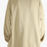 Tan t-shirt worn by a person, showing the t-shirt's fit