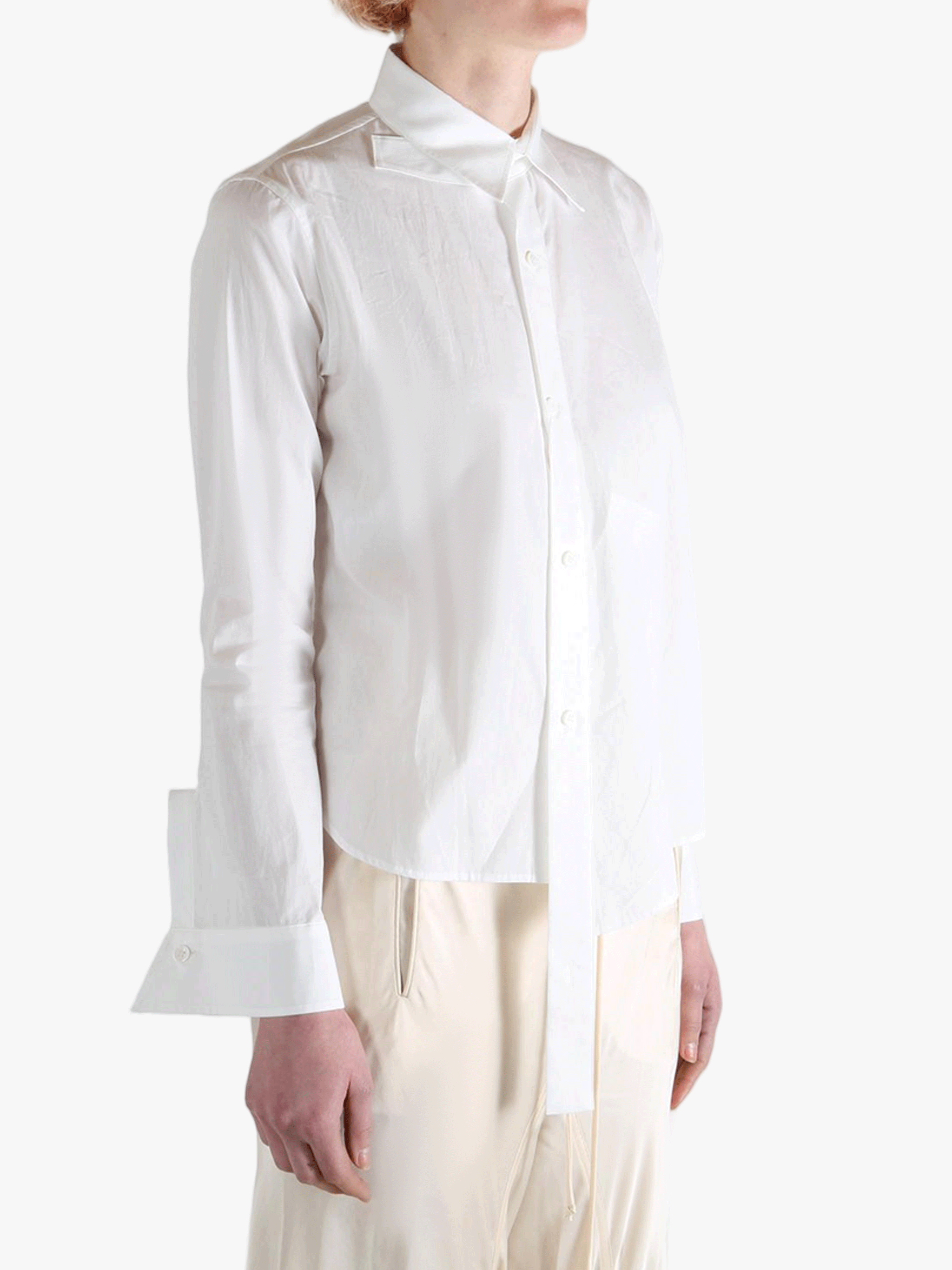 White shirts worn by a person, showing the shirts fit