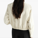Tan jacket, full body view