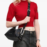 Black bag worn by a person, showing the bag fit