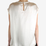 Grey t-shirts worn by a person, showing the t-shirts fit