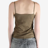 Tan top worn by a person, showing the top's fit