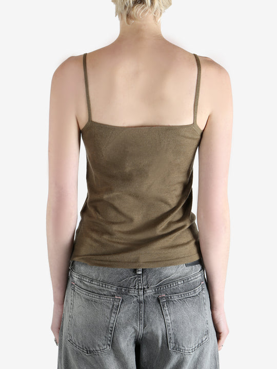 Tan top worn by a person, showing the top's fit