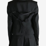 Black jacket worn by a person, showing the  jacket fit