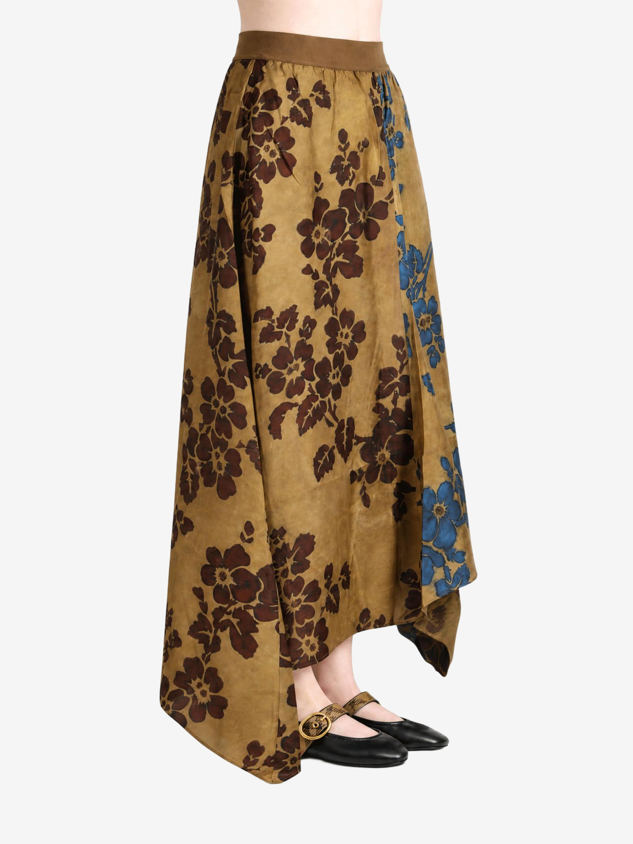 Tan skirt worn by a person, showing the skirt fit