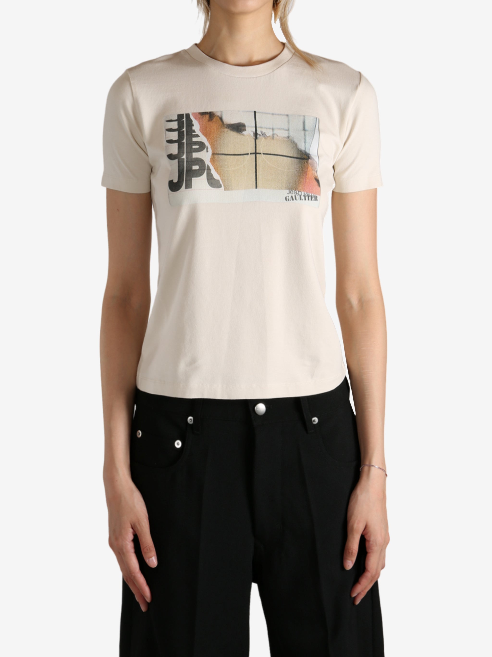 Tan t-shirt worn by a person, showing the  t-shirt fit