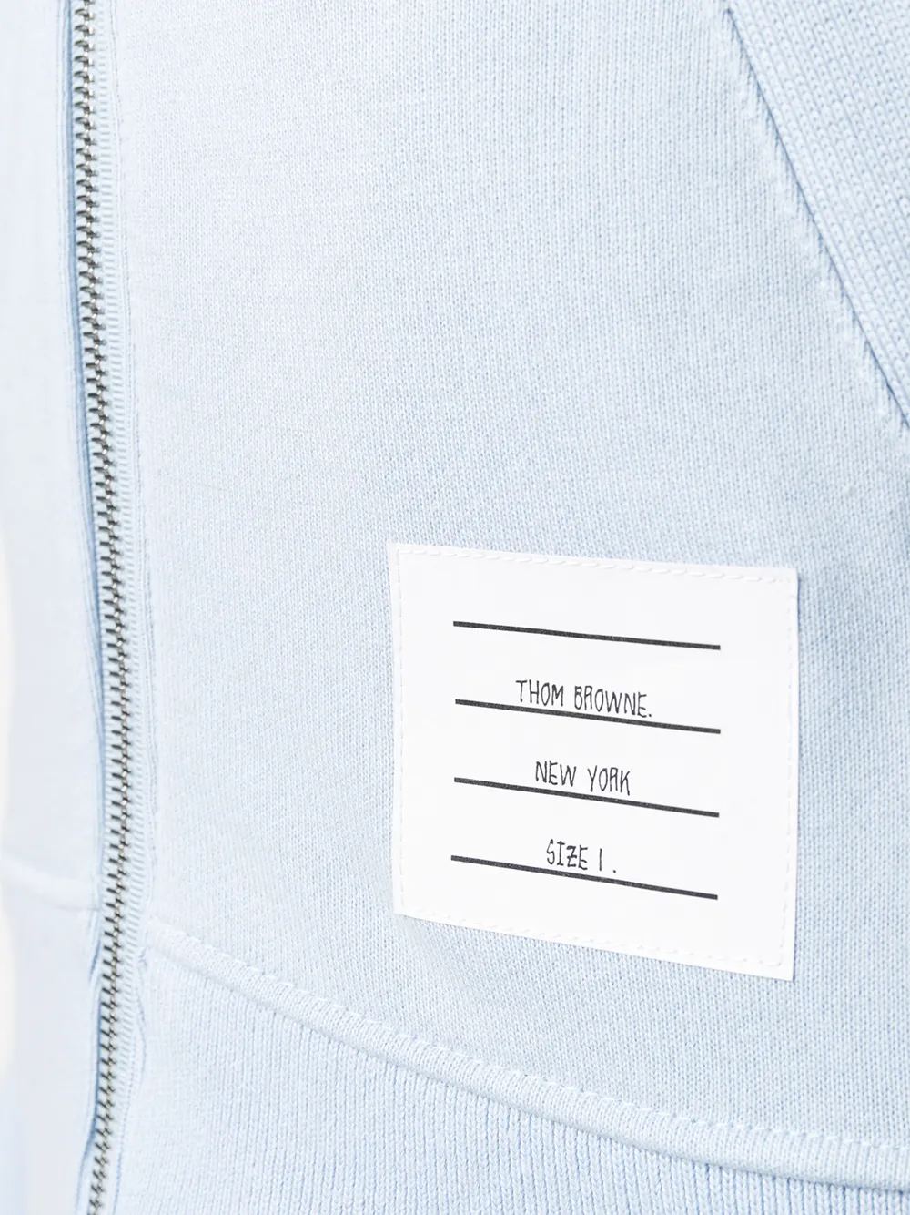 Close up of blue coat,showing texture of the cotton fabric