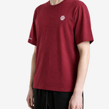 Red t-shirt worn by a person, showing the t-shirt fit