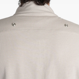Grey t-shirt worn by a person, showing the t-shirt fit