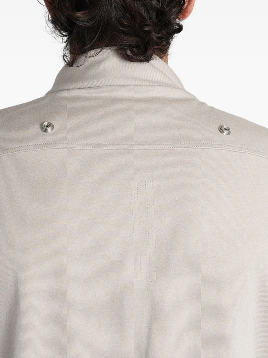 Grey t-shirt worn by a person, showing the t-shirt fit