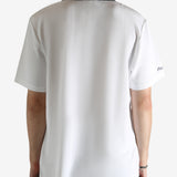 White shirt worn by a person, showing the shirt's fit