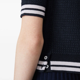 Close up of white knitwear, showing texture of the Silk fabric