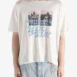 White t-shirt worn by a person, showing the shirt's fit