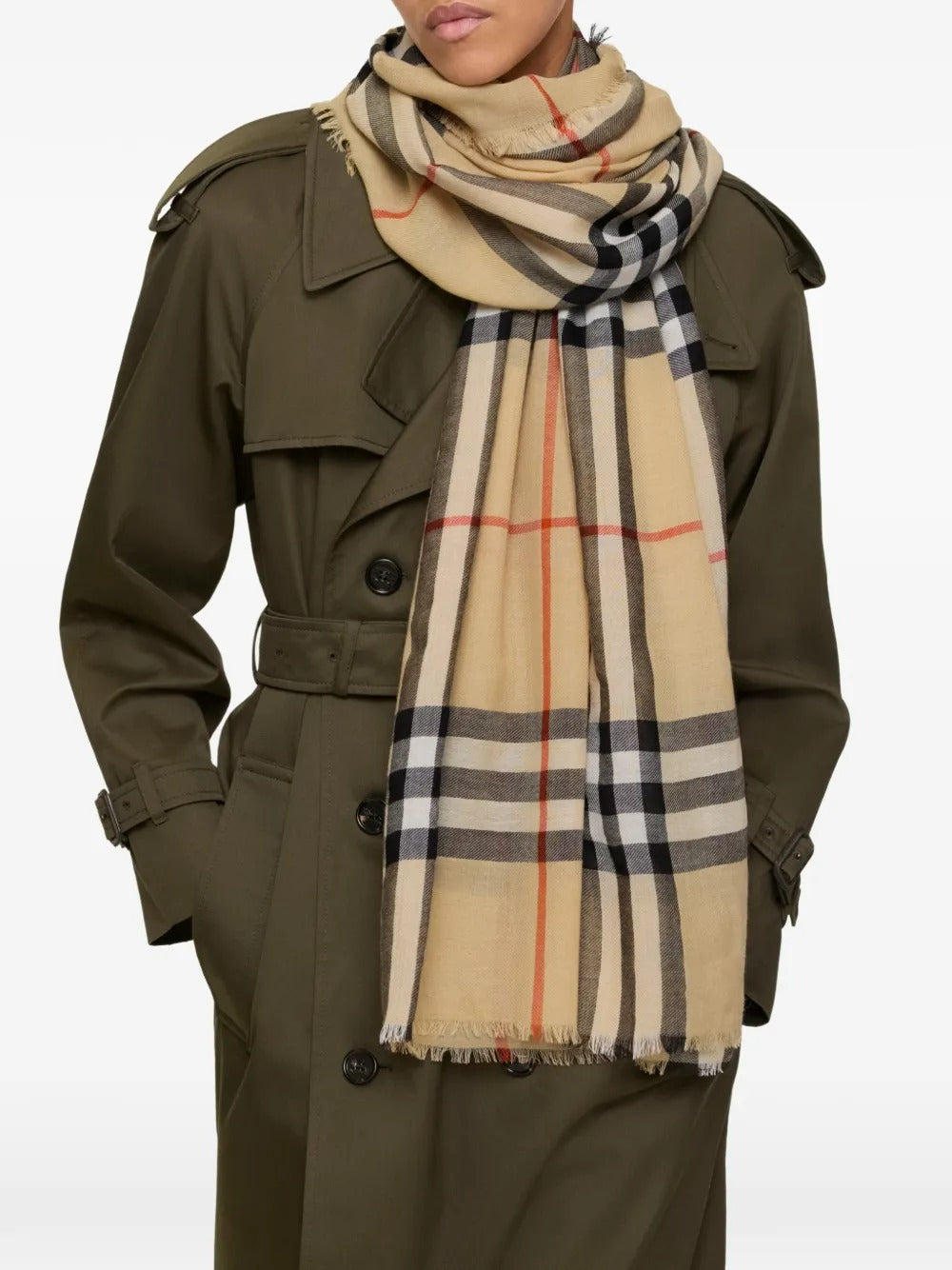 Tan scarf worn by a person, showing the scarf's fit