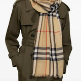 Tan scarf worn by a person, showing the scarf's fit