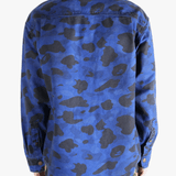 Navy shirt worn by a person, showing the shirt's fit