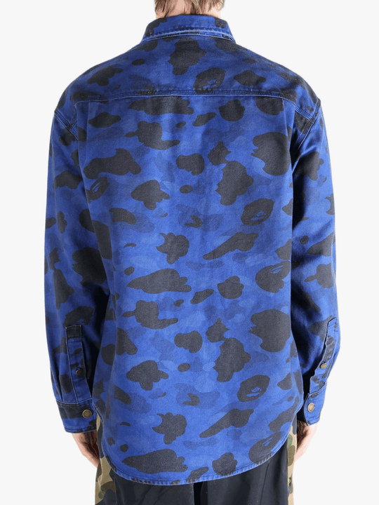 Navy shirt worn by a person, showing the shirt's fit