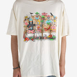 White t-shirt worn by a person, showing the shirt's fit