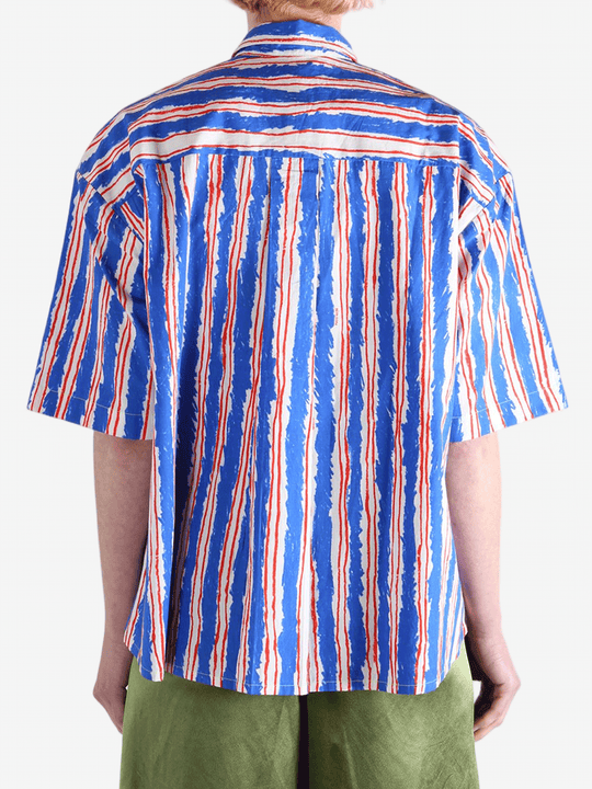 Blue shirts worn by a person, showin the shirt's fit