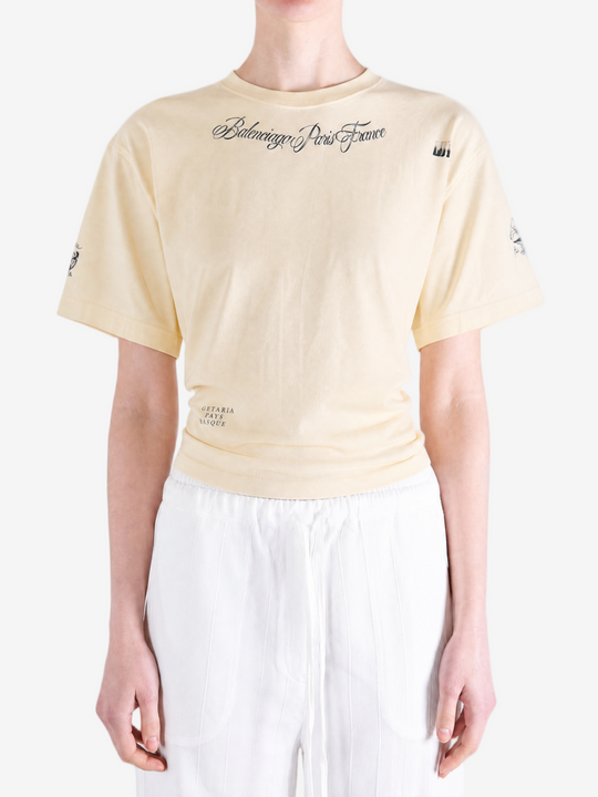 Tan top worn by a person, showing the top fit