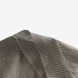 Close up of grey hats, showing texture of the wool fabric