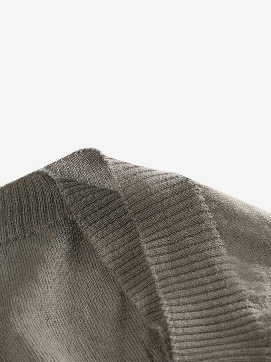 Close up of grey hats, showing texture of the wool fabric