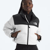 White jacket worn by a person, showing the jacket fit