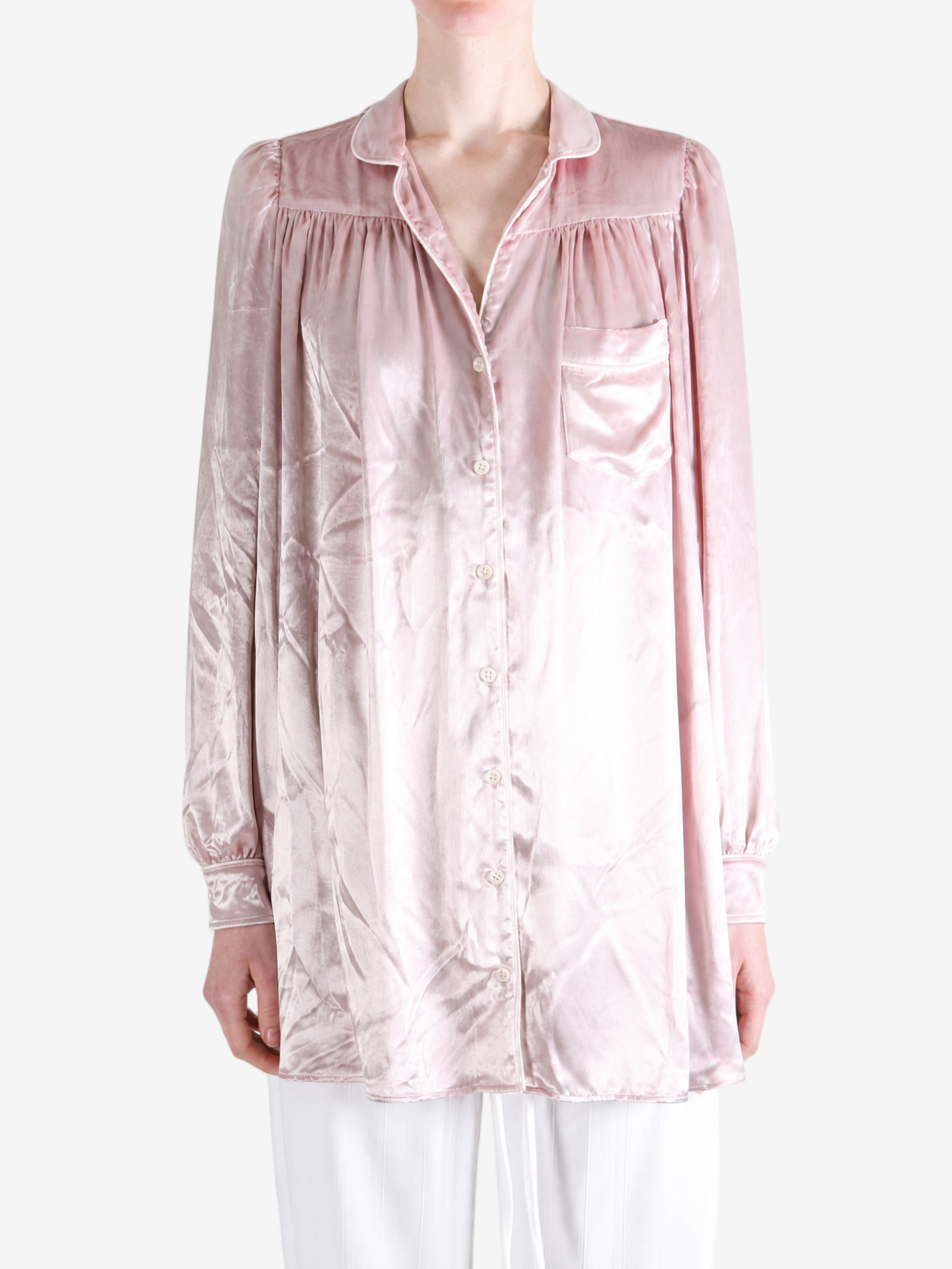 Pink dress worn by a person, showing the dress fit