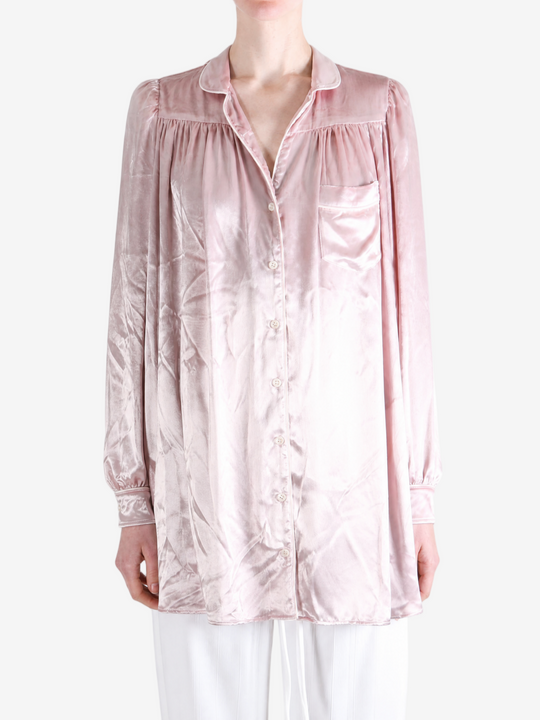 Pink dress worn by a person, showing the dress fit