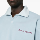 Blue top worn by a person, showing the top fit