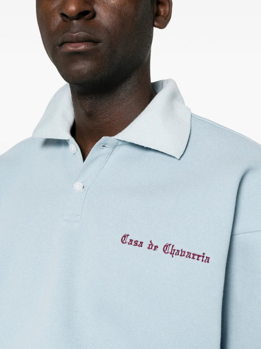 Blue top worn by a person, showing the top fit