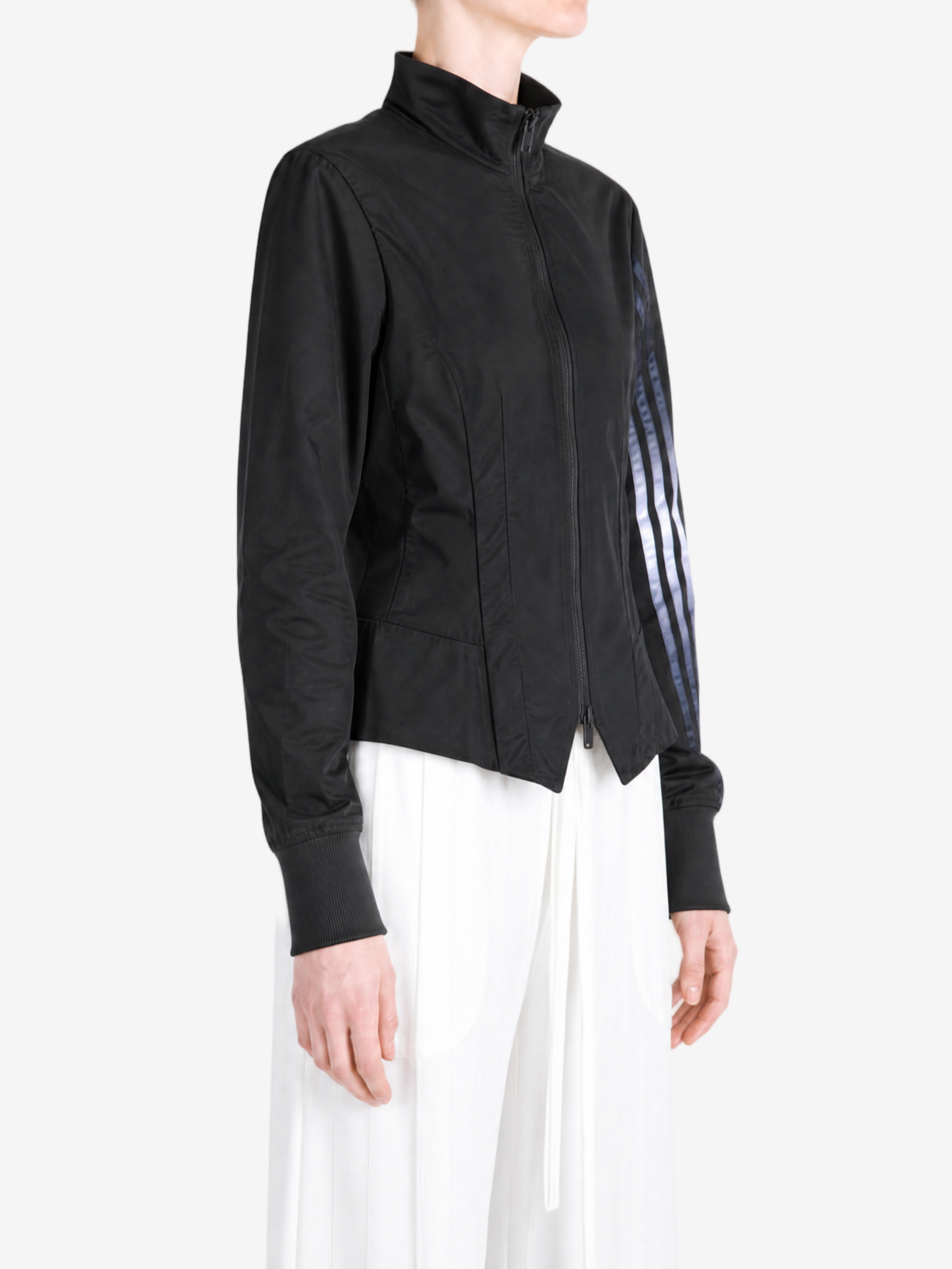 Black top worn by a person, showing the top fit