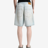 Blue shorts worn by a person, showing the shorts fit