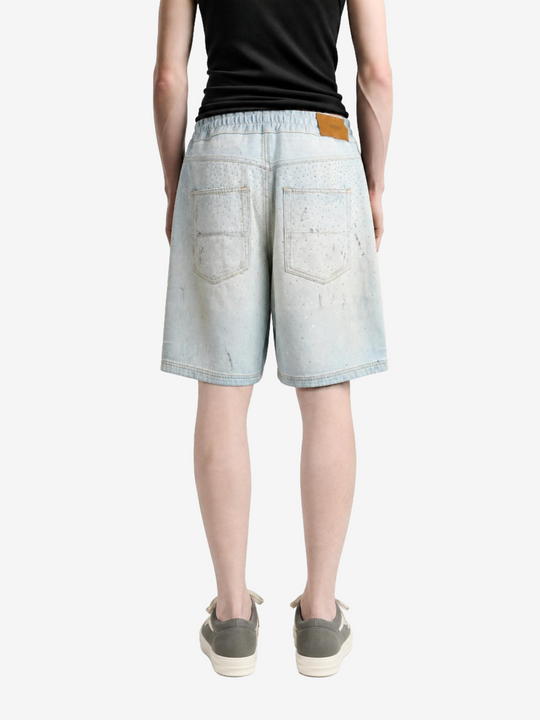 Blue shorts worn by a person, showing the shorts fit