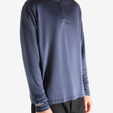 Navy pullover worn by a person, showing the pullover's fit