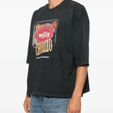 Black t-shirt worn by a person, showing the t-shirt fit